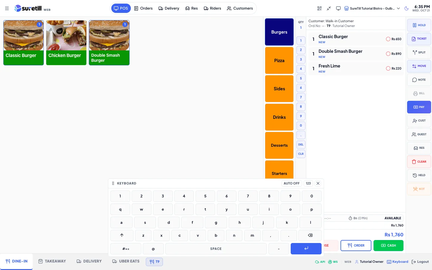 The floating on-screen keyboard above the POS bottom bar