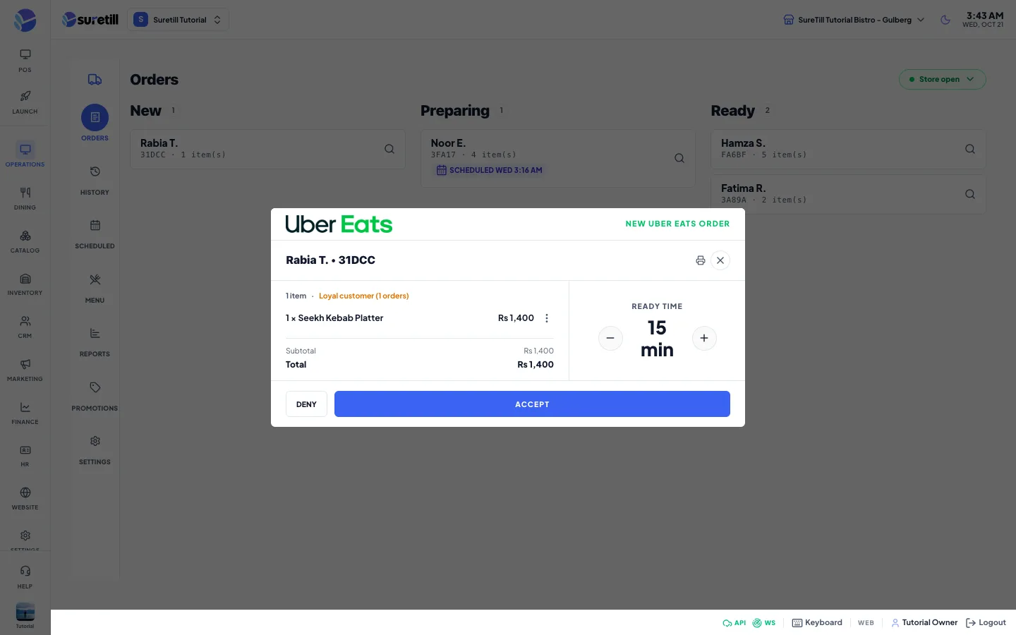 The New Uber Eats order popup over the Orders board, showing the customer, the items, a note, the ready time and the Deny and Accept buttons
